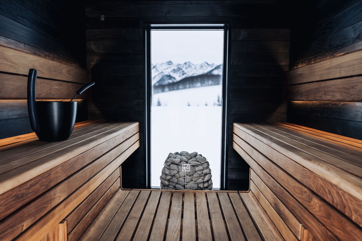 Steam rising in a sauna with warm wood interior